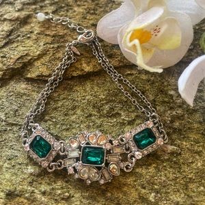 GV9 silver tone bracelet with green rhinestones